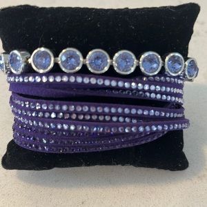 Touchstone Crystal purple wrap and dark purple ice bracelets.